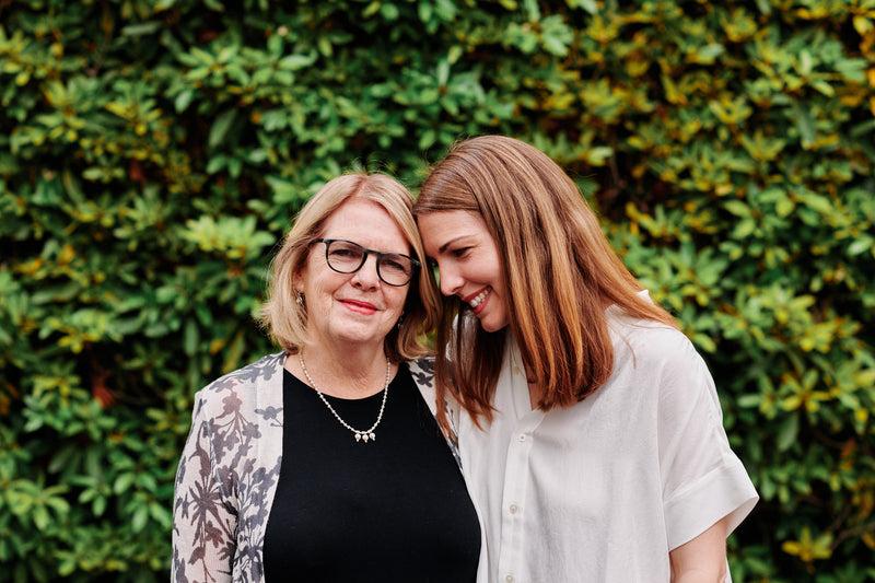 nancy and caroline smiling together